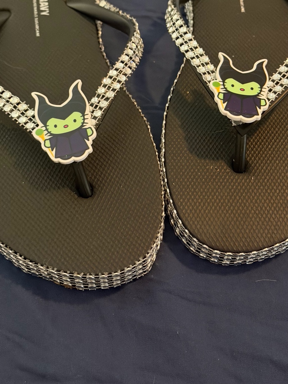 Black Flip Flop Sandals with Green Cartoon Charm